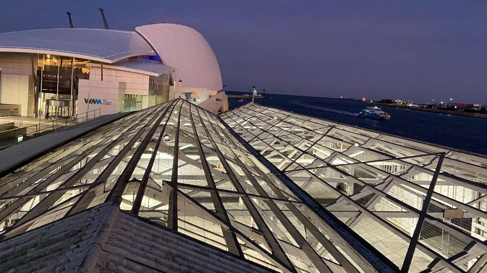 Nighttime exposed roof panels photographed during an asbestos roof removal and replacement in Fremantle by Focus demolition.