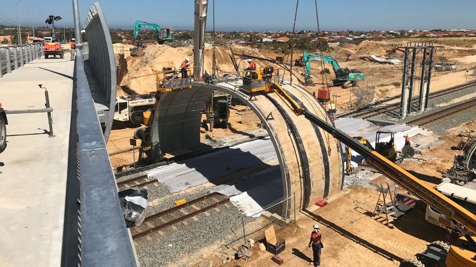 Birds eye view of the demolition of the Mitchell Freeway Bridge showing Focus Demolition workers dismantling panels.