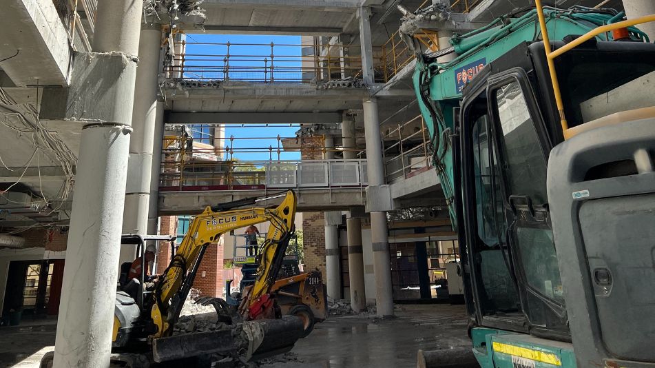 Heavy machinery inside Midland Square in Perth performing multi-storey heavy duty structural demolition.