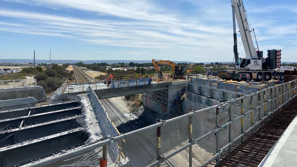 Demolition at Ranford Road Bridge in Canning Vale with heavy machinery ready to start and Focus demolition employees.